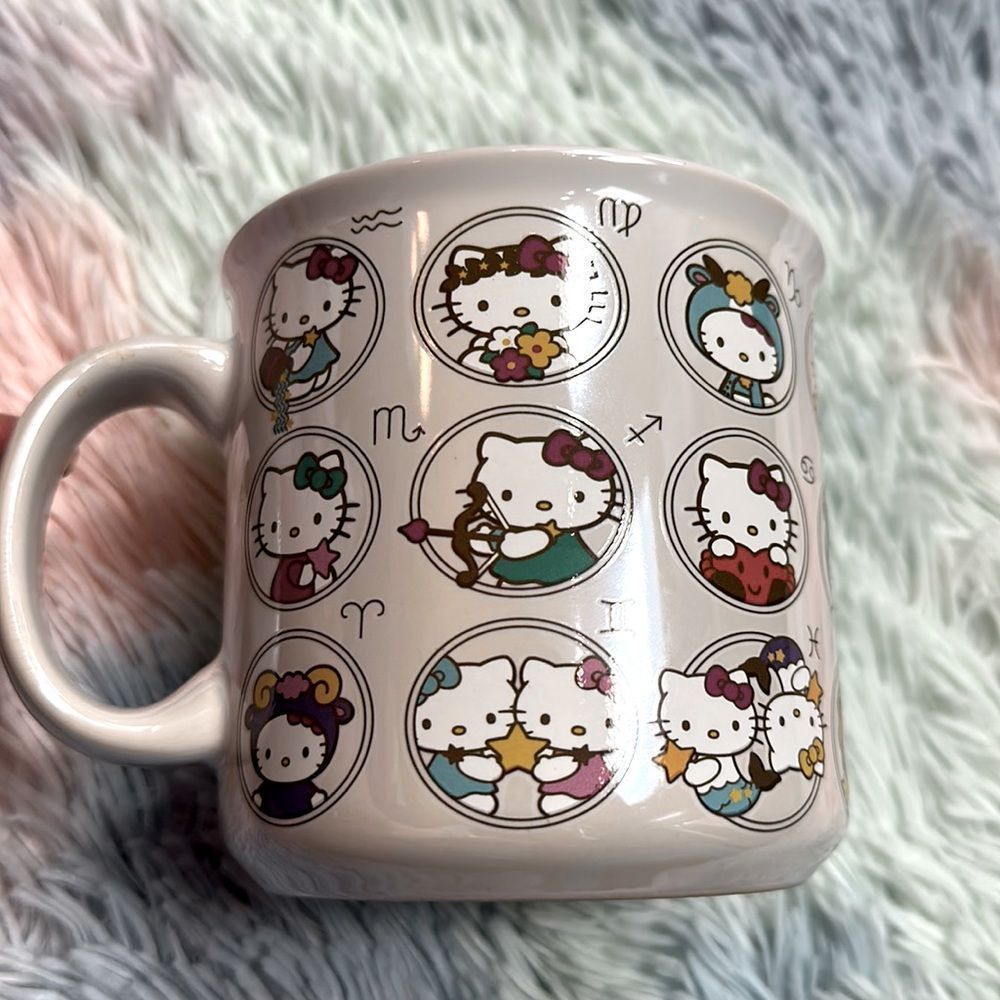 Hello kitty zodiac signs all over white iridescent color 20 oz by Sanrio